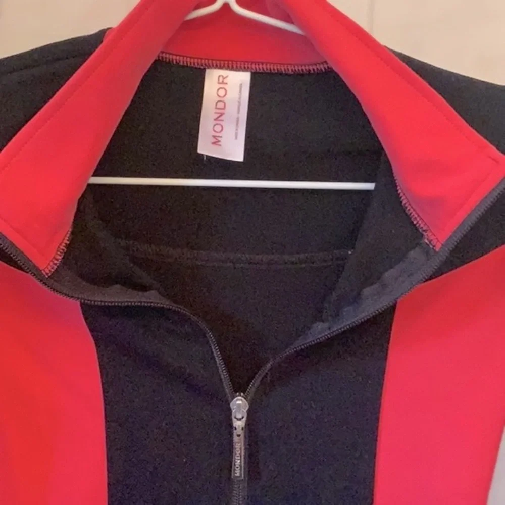 Mondor girls black and coral skating jacket in size 12 - 14